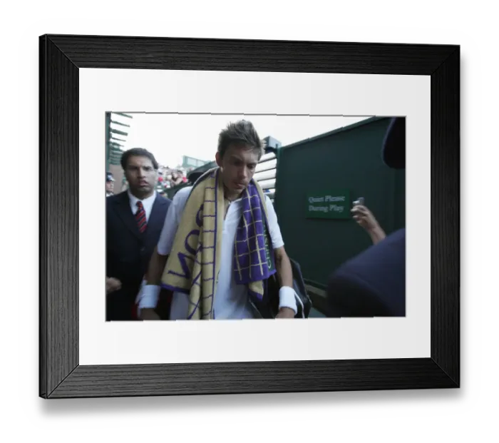 Framed Print : Nicolas Mahut Walks Off After Longest Game Ever Framed Print : Nicolas Mahut Walks Off After Longest Game Ever