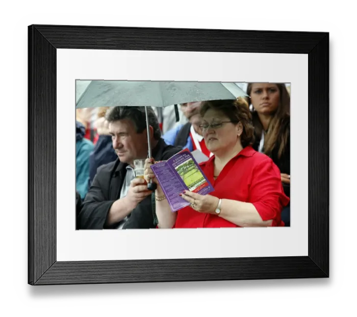 Framed Print : Tennis Fans In Rain Framed Print : Tennis Fans In Rain