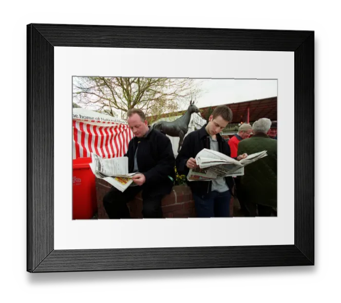 Framed Print : Racegoers Study Form Framed Print : Racegoers Study Form