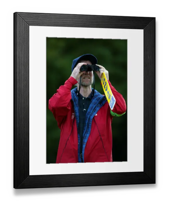 Framed Print : Golf Marshall With Binoculars Framed Print : Golf Marshall With Binoculars