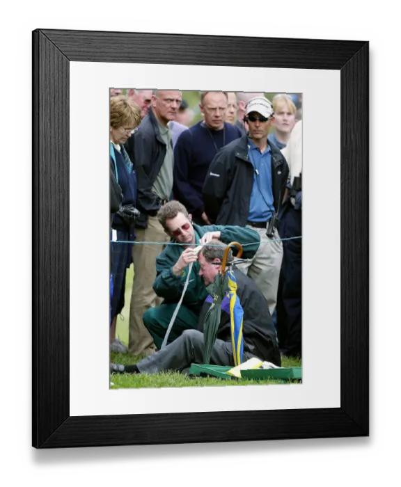 Framed Print : Spectator Is Treated After Struck By Golf Ball Framed Print : Spectator Is Treated After Struck By Golf Ball