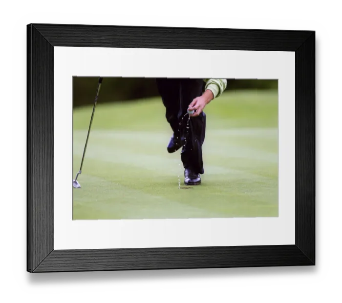 Framed Print : Golfer Retrieves Wet Ball Framed Print : Golfer Retrieves Wet Ball