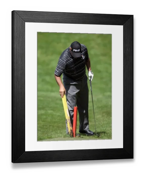 Framed Print : Angel Cabrera Removes Stakes On 7th Hole Framed Print : Angel Cabrera Removes Stakes On 7th Hole