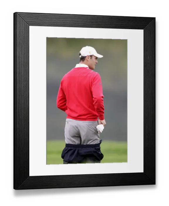 Framed Print : Martin Kaymer Removes Over Trousers Framed Print : Martin Kaymer Removes Over Trousers