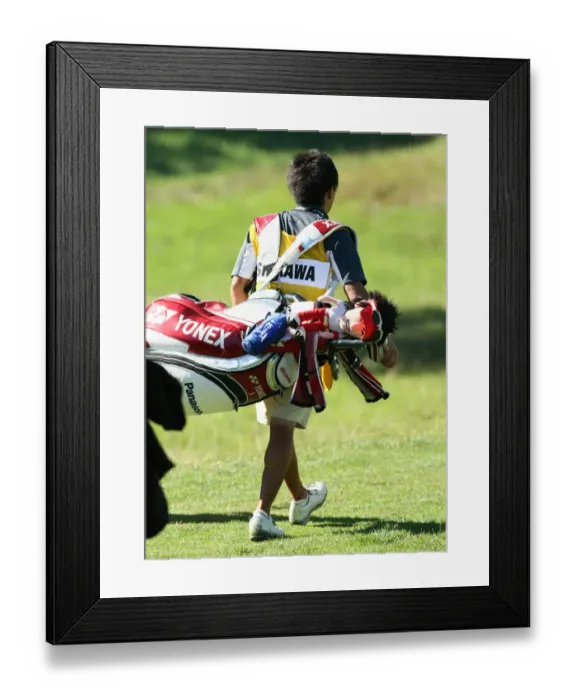 Framed Print : Ryo Isikawa Caddy And Golf Bag Framed Print : Ryo Isikawa Caddy And Golf Bag
