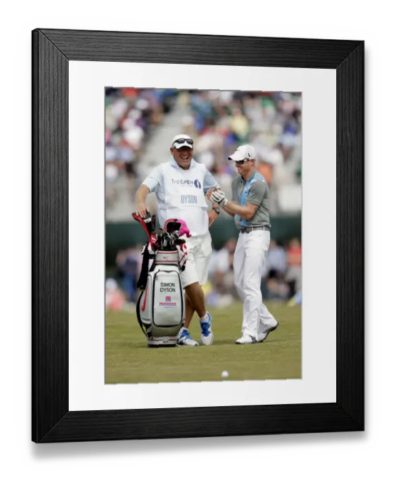 Framed Print : Simon Dyson Enjoys A Light Moment With His Caddy Framed Print : Simon Dyson Enjoys A Light Moment With His Caddy