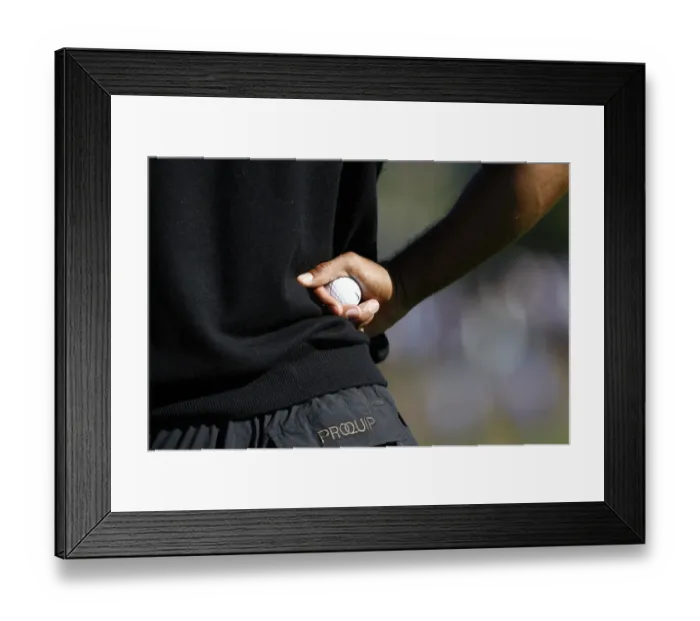 Framed Print : Tiger Woods Holds Golf Ball Framed Print : Tiger Woods Holds Golf Ball