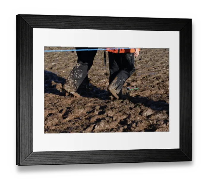 Framed Print : Spectators Wade Through Mud Framed Print : Spectators Wade Through Mud