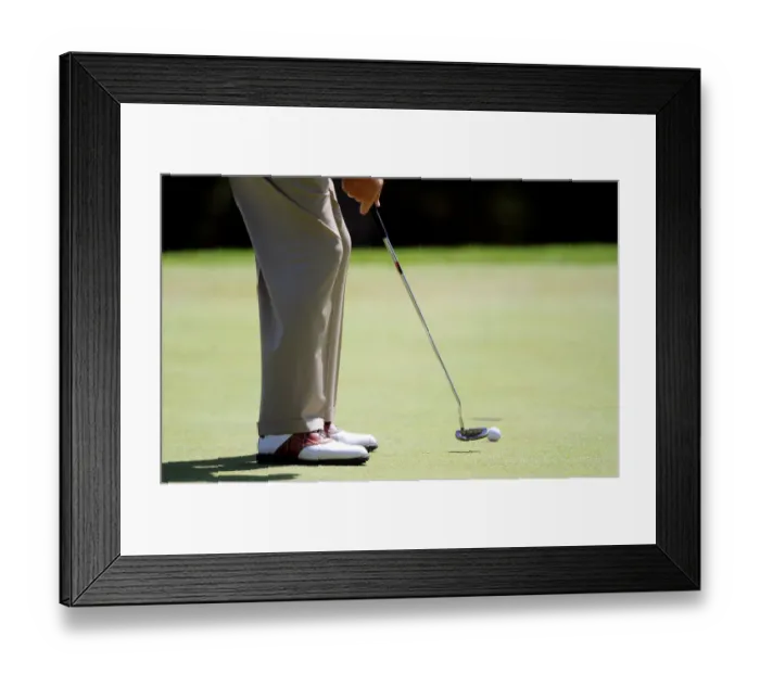 Framed Print : Golfer Putting On Green Framed Print : Golfer Putting On Green