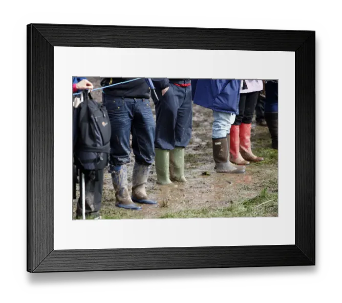 Framed Print : Spectators In The Mud