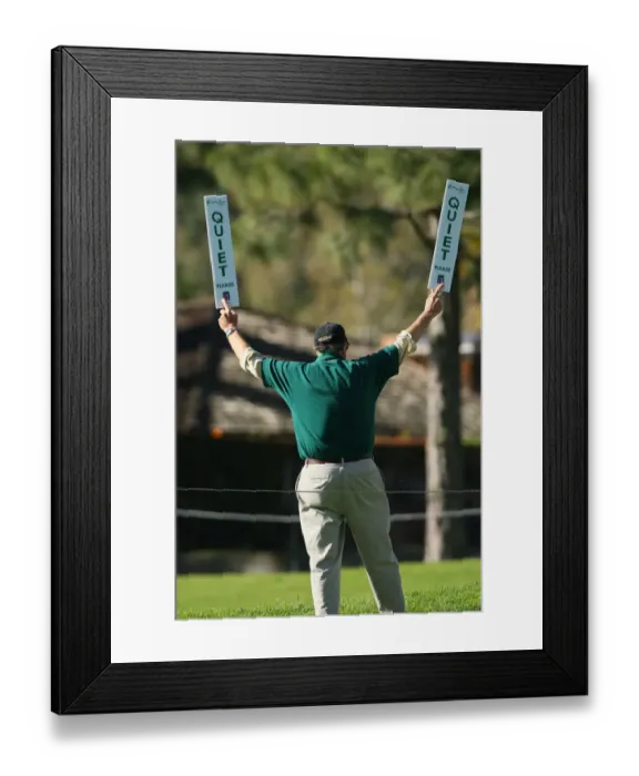 Framed Print : Golf Marshal Holds Quite Signs