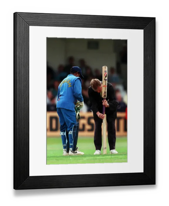 Framed Print : Barry Dudleston Fixes Stumps Framed Print : Barry Dudleston Fixes Stumps