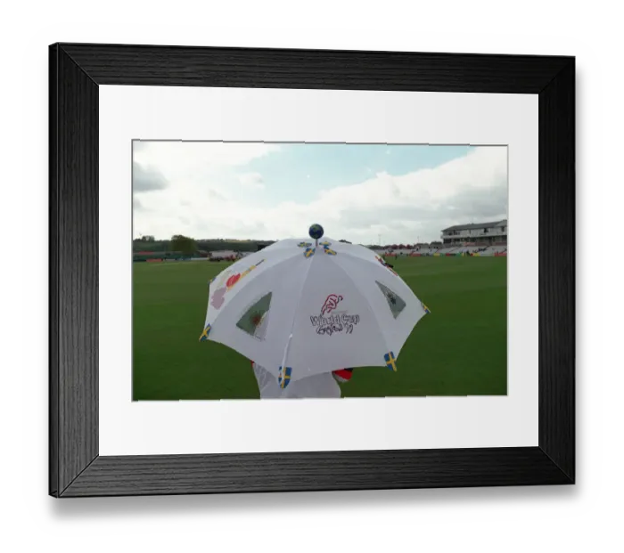Framed Print : Umbrellas Out At World Cup Framed Print : Umbrellas Out At World Cup