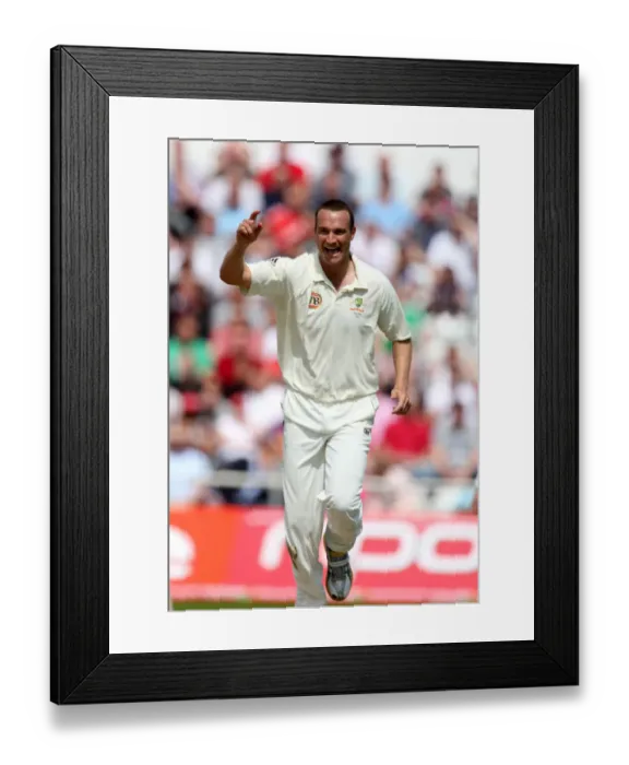 Framed Print : Stuart Clark Ceebrates Cook Wicket Framed Print : Stuart Clark Ceebrates Cook Wicket