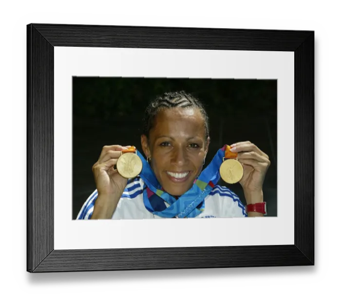 Framed Print : Kelly Holmes With Gold Medals Framed Print : Kelly Holmes With Gold Medals