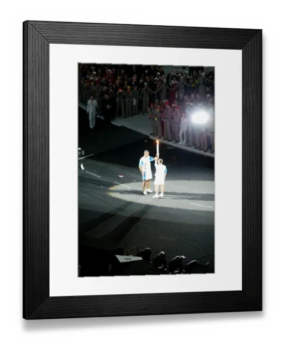 Framed Print : Nikos Kaklamanakis Receives The Torch From Ioannis Melissand