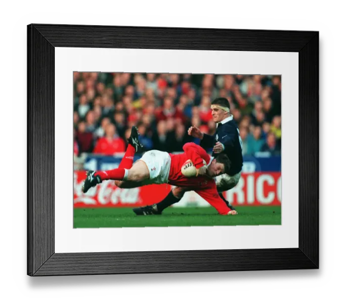 Framed Print : Scott Gibbs Evades Wainwright Framed Print : Scott Gibbs Evades Wainwright