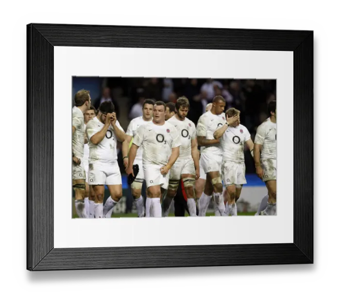 Framed Print : England Players Leave The Field After Defeat By Wales Framed Print : England Players Leave The Field After Defeat By Wales