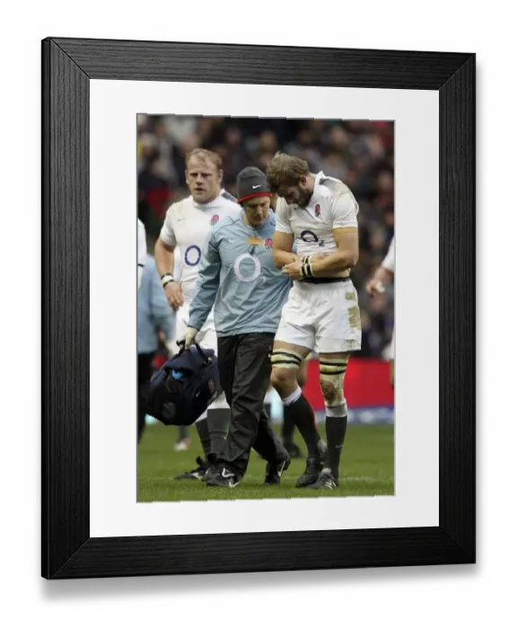 Framed Print : Tom Croft Leaves The Field With Injury