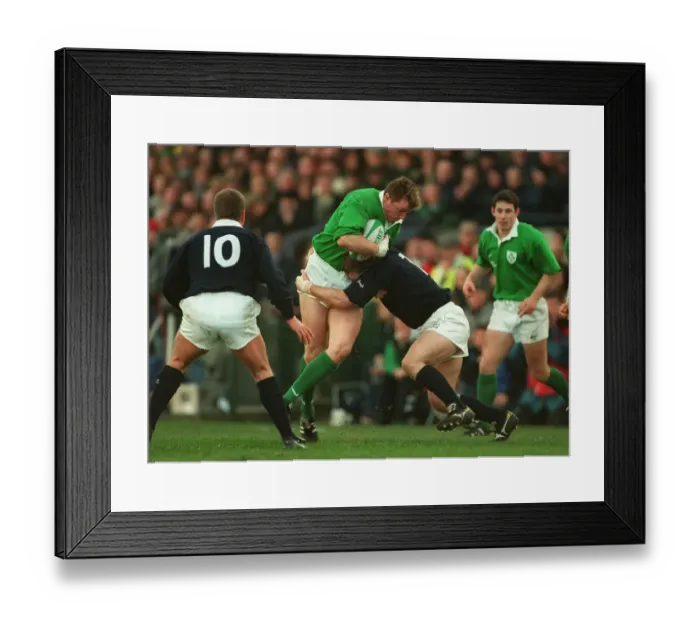 Framed Print : Denis Hickie Is Tackled By