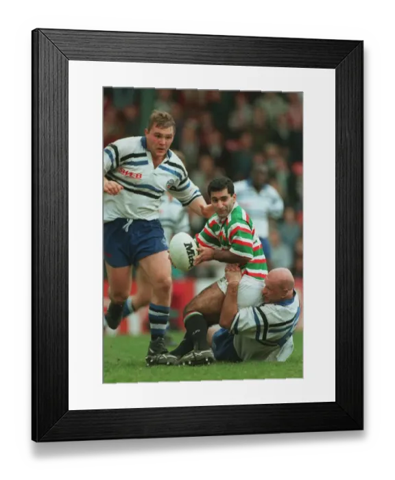 Framed Print : Aadel Kardooni Is Tackled By Framed Print : Aadel Kardooni Is Tackled By