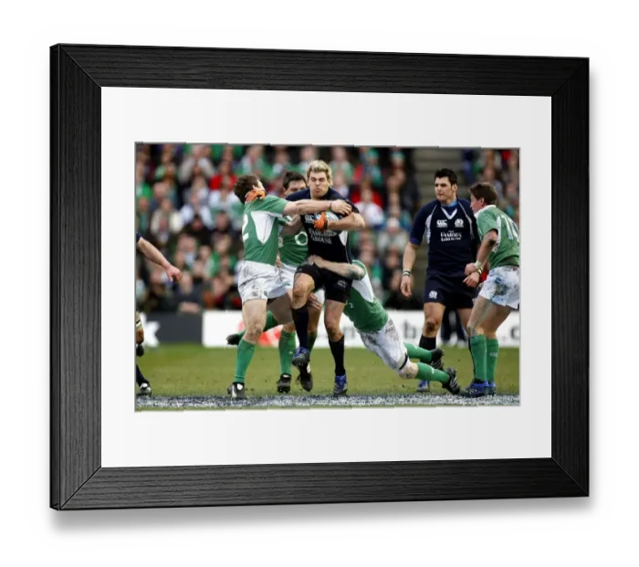 Framed Print : Sean Lamont Breaks Through