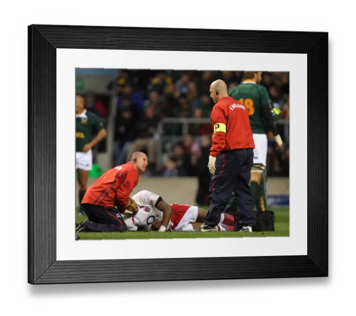 Framed Print : Delon Armitage Lies Injured Framed Print : Delon Armitage Lies Injured