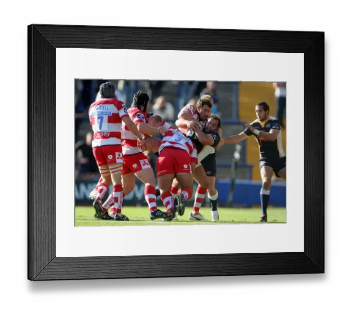 Framed Print : Juan Gomez Gets Challenged By Gloucester Pack Framed Print : Juan Gomez Gets Challenged By Gloucester Pack