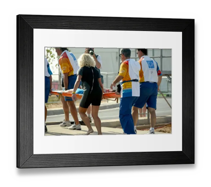 Framed Print : Rower Receives Medical Aid Framed Print : Rower Receives Medical Aid