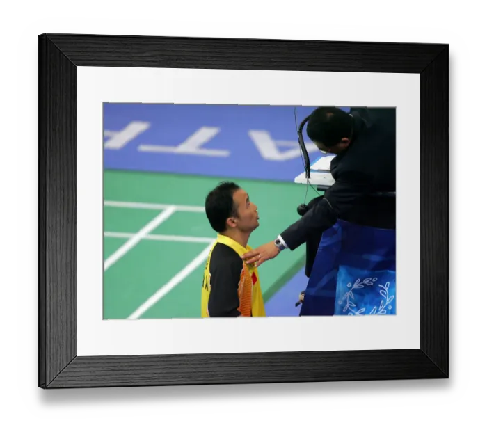 Framed Print : Jun Zhang & Umpire