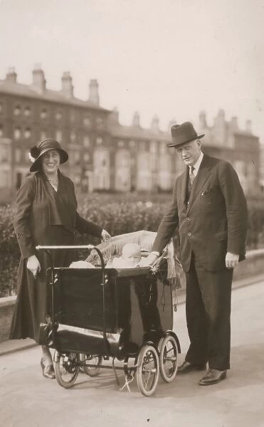 Couple  /  Baby in Pram 1920