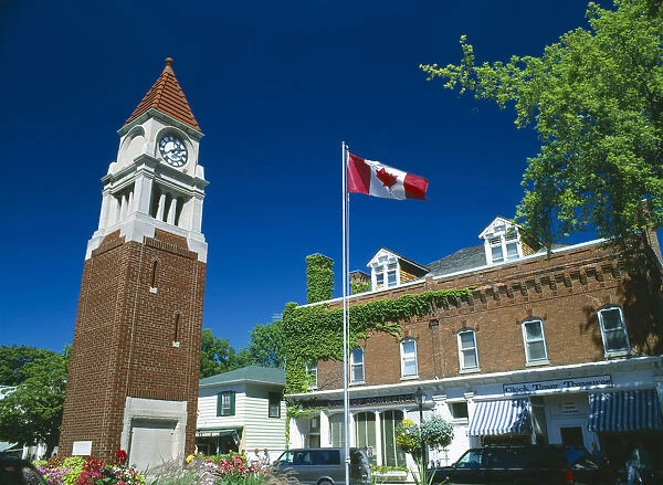 10099800. CANADA Ontario Niagara on the Lake Queen Street Clock Tower & Flag
