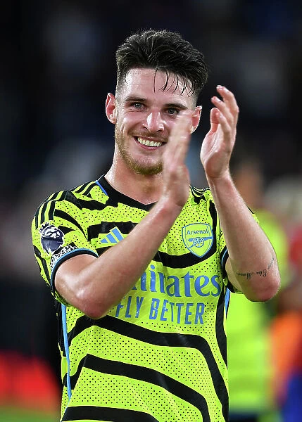 Arsenal's Declan Rice Celebrates with Fans after Crystal Palace Victory, 2023-24 Premier League