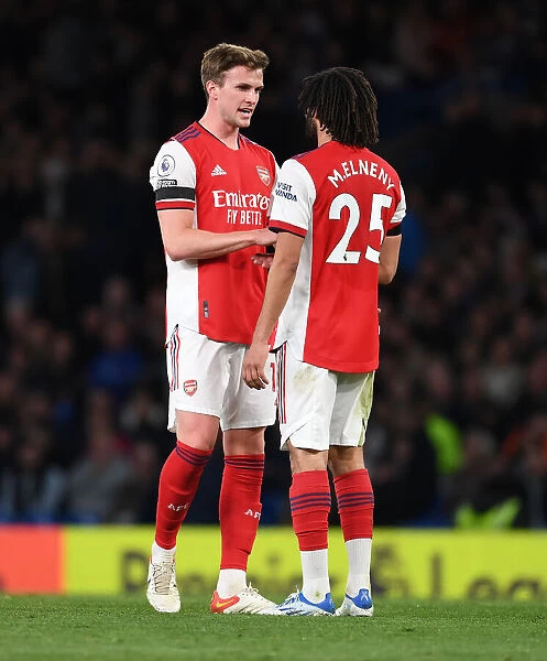 Arsenal's Holding and Elneny in Action against Chelsea - Premier League 2021-22