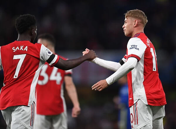 Arsenal's Unstoppable Duo: Smith Rowe and Saka Celebrate Premier League Victory over Chelsea