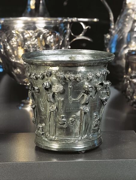 Boscoreale treasure, Silver glass, Relief with skeletons representing Greek philosophers and inscriptions advising to enjoy pleasures of life, From Boscoreale (province of Naples)