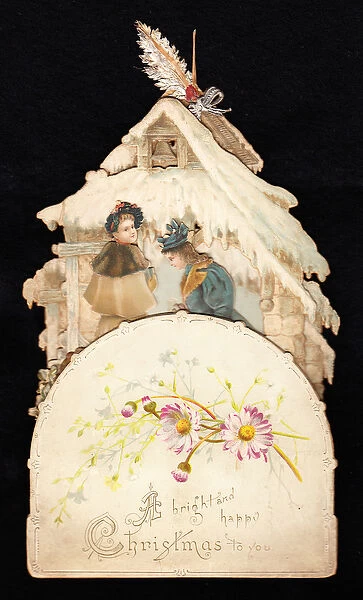 A Victorian die cut pop up Christmas card of two women in front of a snow covered cottage