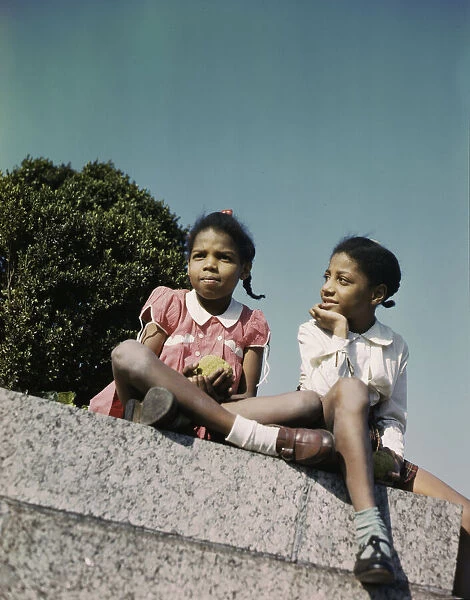 Two little girls in a park near Union Station, Washington, D. C. ca. 1943. Creator: Unknown