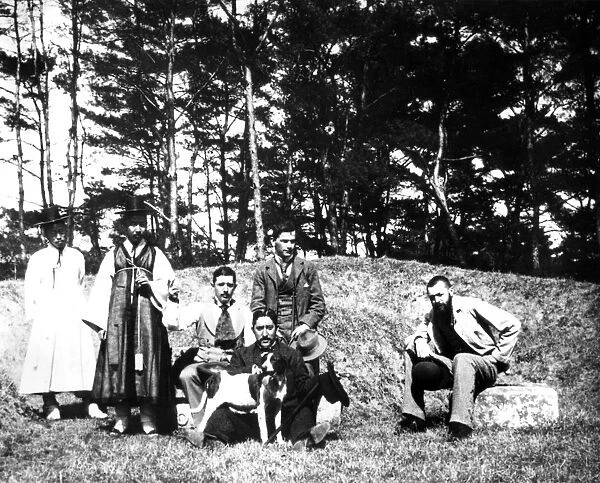 Western visitors with locals, Nam San, Korea, 1900