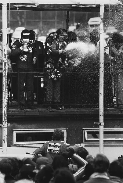 1976 Race of Champions: James Hunt, 1st position, on the podium with Alan Jones, 2nd position and Jacky Ickx, 3rd position, portrait