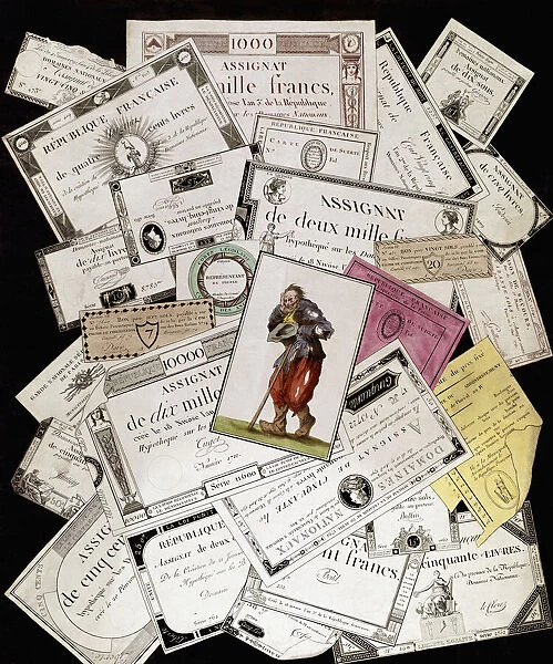 Assignats, paper bills issued as currency from 1789 to 1796 during the French Revolution. They were initially backed by the value of expropriated properties, but as those properties were sold and still more assignats were issued the system succumbed to inflation. The Tarot card of The Fool, or The Beggar, on top of the assignats sums up the poor mans lot during the latter years of the assignats hyperinflation