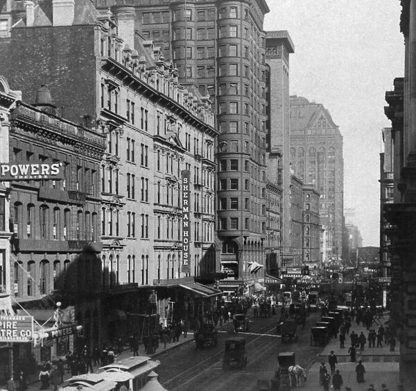 Historic image in black and white of busy Randolph Street in Chicago; Chicago, Illinois, United States of America