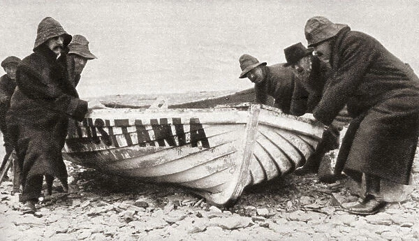 One of the lifeboats from the RMS Lusitania, sunk by a German U-boat in 1915, is hauled onto the beach on the coast of Ireland. From The Pageant of the Century, published 1934