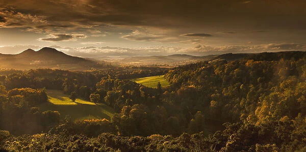 Sunlight Cast On Trees And Mountains Through The Clouds; Scots View, Scottish Borders, Scotland