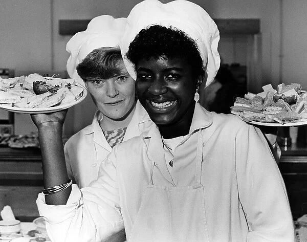 'As Good as New'Shops in Coventry. Canteen trainees Yvonne (left