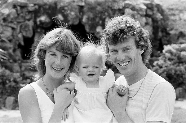 England footballer Graham Rix relaxing with his wife and baby girl at the team hotel