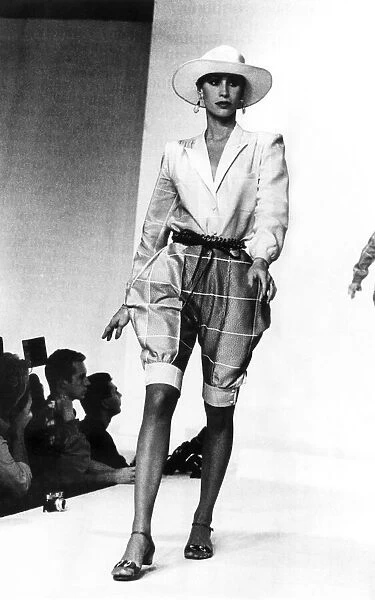 Fashion - Shorts: Valentino. Model wears checked flared jodhpurs shorts with jacket