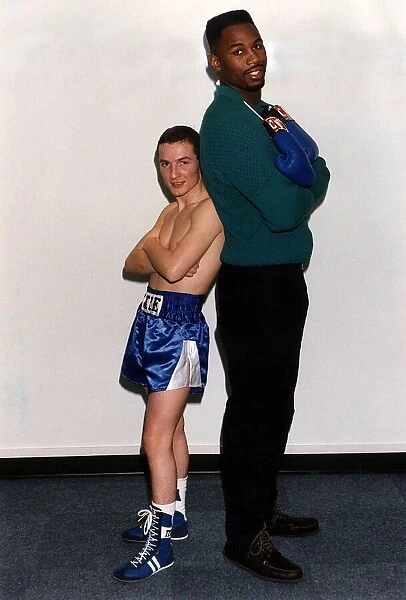 Lennox Lewis Heavyweight Boxer stands well over Mickey Cantwell