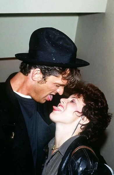 Rupert Everett actor and Ruby Wax kiss stars in the film Hearts of Fire