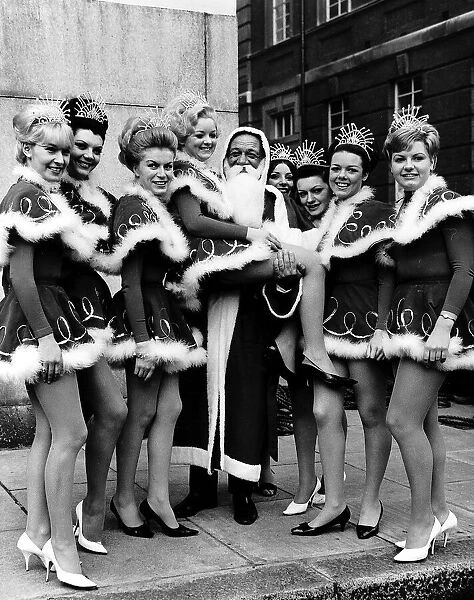 Sid James Comedy Actor Carry On Films collecting toys for charity at the Variety Club